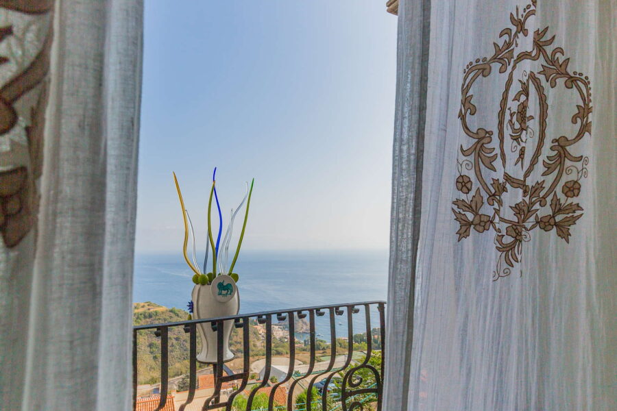 VillaArte_Taormina_bedroom1floorIsolabellaView_ScentOfSicily
