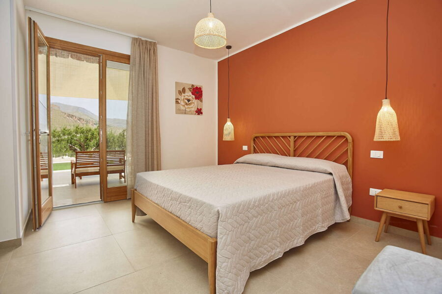 VillaPietraDorata-CastellammareDelGolfo-CharmingBedroomTerrace View-ScentOfSicily Charming Bedroom with Terrace View at Villa Pietra Dorata – Sicily Luxury Villas