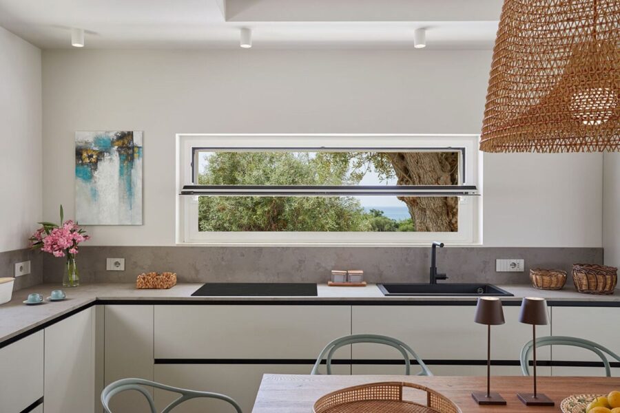 Kitchen with window and garden view at villa Azure Essence Sicily – Scent of Sicily