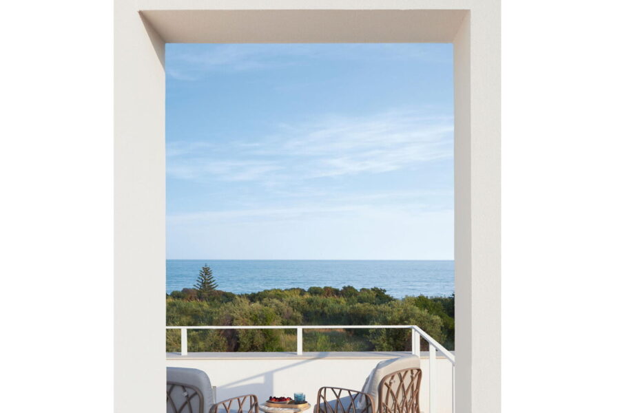 Terrace with sea view and lounge chairs at Azure Essence villa in Sicily